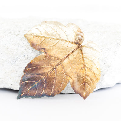 Silver brooch maple