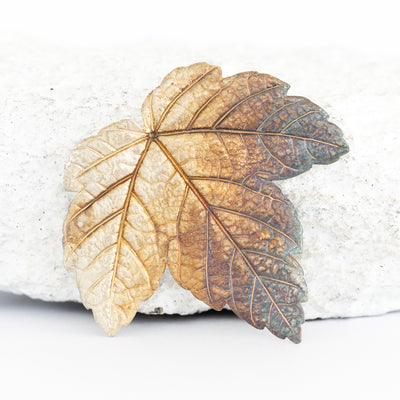 Silver brooch maple